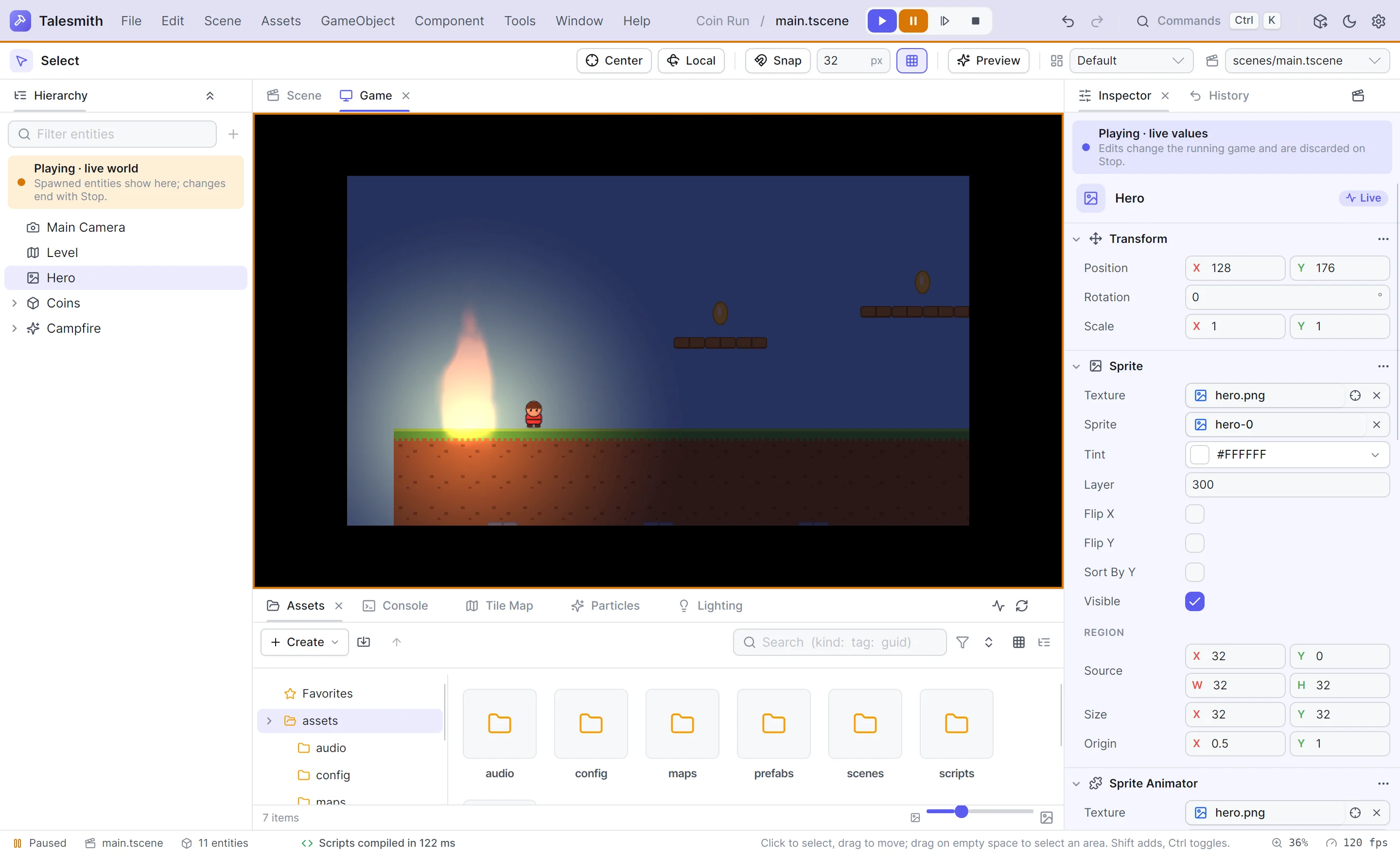 Play mode paused: the app bar's strip and the Game panel's frame in amber, the hero's live values in the inspector